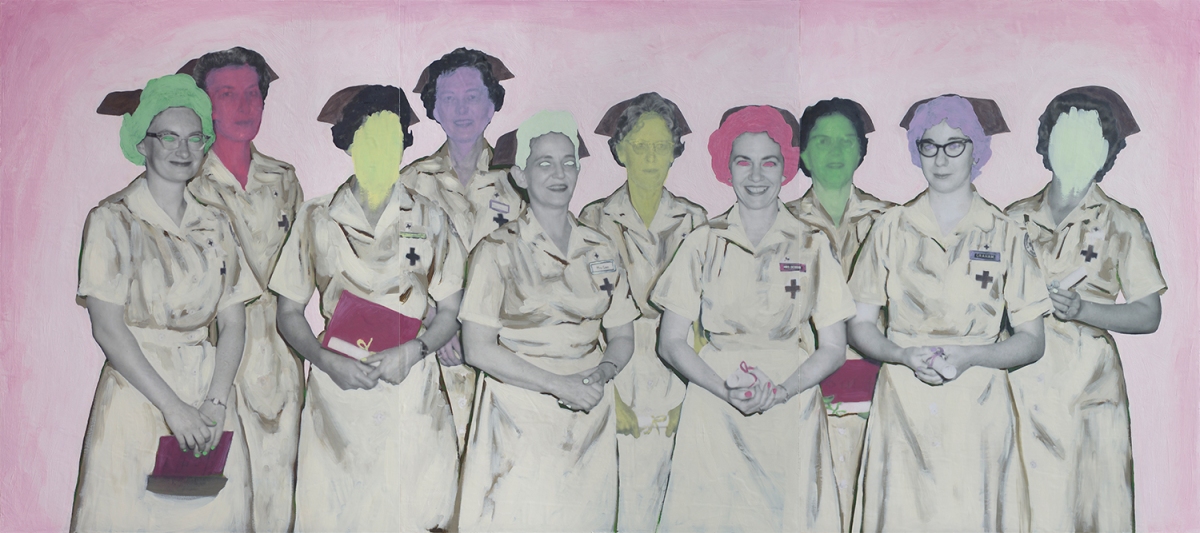 Group of nurses posing in front of the camera.