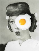 Collage of a classic pin up portrait with a fried egg that is covering an eye of the subject.