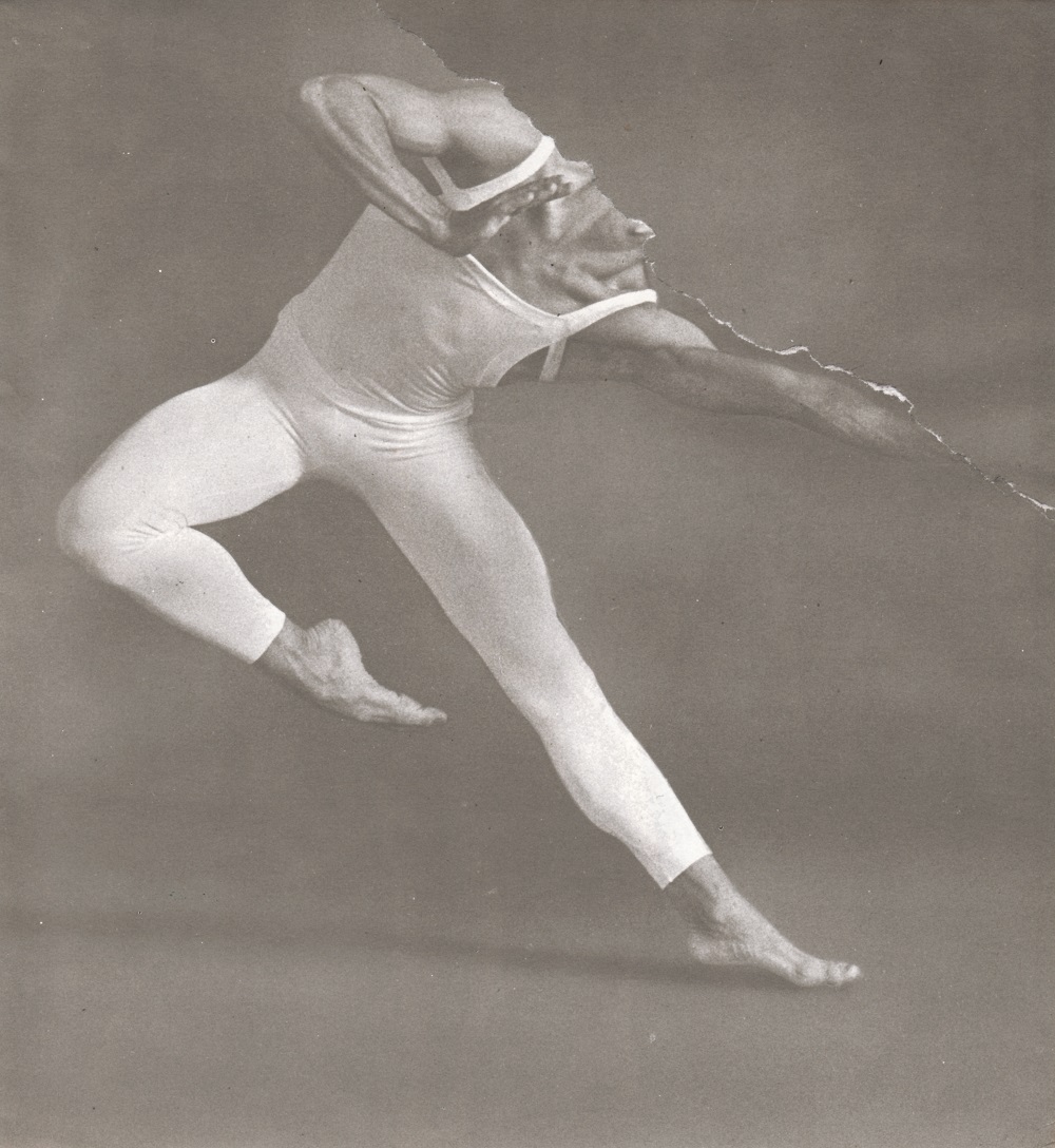 Black and white photo of a defaced male dancer.