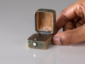 Handcrafted dark miniature scenes realised inside vintage jewellery boxes.