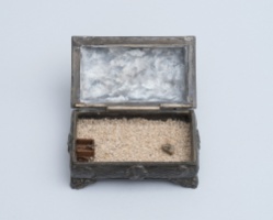 Handcrafted dark miniature scenes realised inside vintage jewellery boxes.