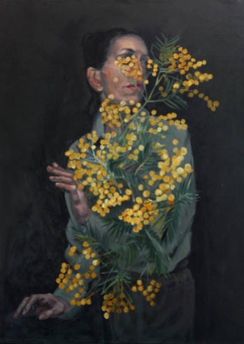 Woman portait with yellow flowers.