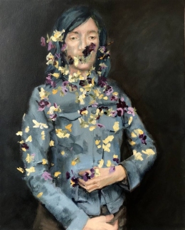 Woman portait with viola flowers.