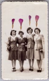 Dried pink petals over a vintage photo of a group of women.
